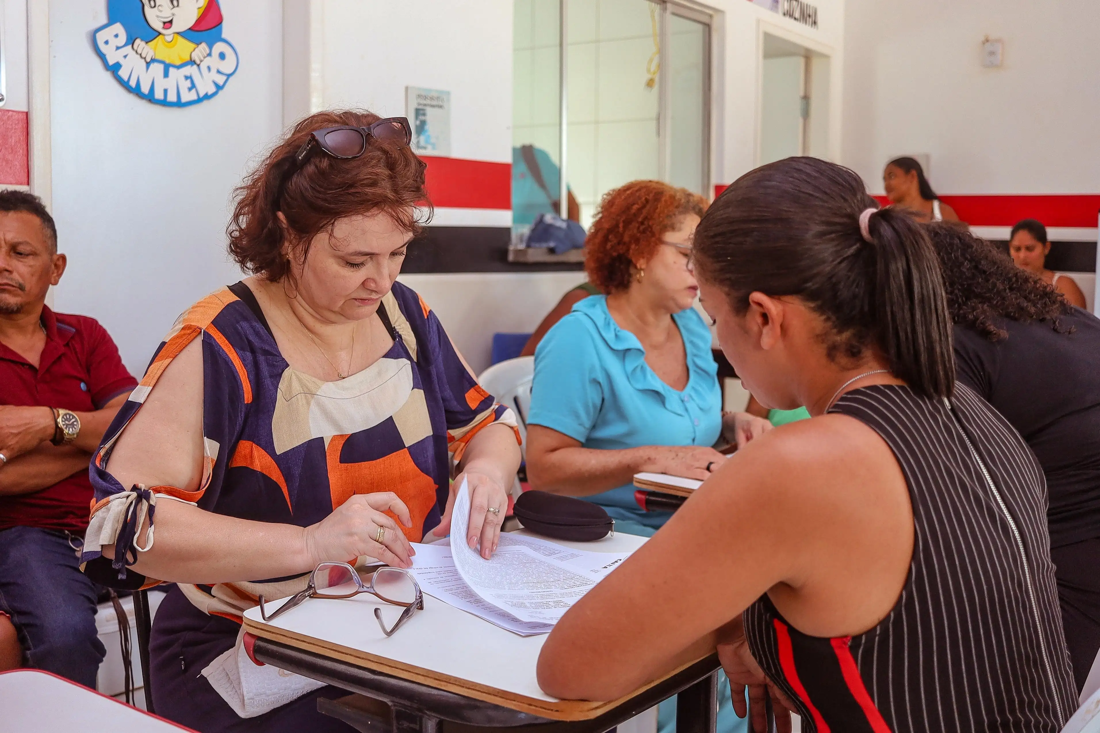 Foto 3 – Famílias do povoado Poraquê contempladas com casas do programa MCMV - Rural assinam contrato com a Caixa